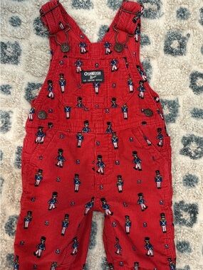 OshKosh B'gosh Red Corduroy Toy Soldier Print Overalls